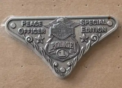 I'm offering a Harley-Davidson Special Edition Peace Officer Police Crest Medallion. This is a genui...