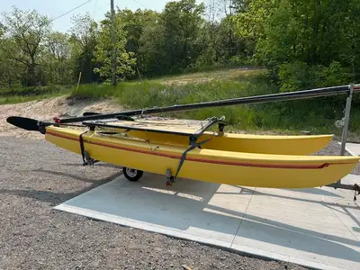 Excellent condition. Ready to sail. No repairs to hulls or sails. Has main sail, jib, and trapeze. N...