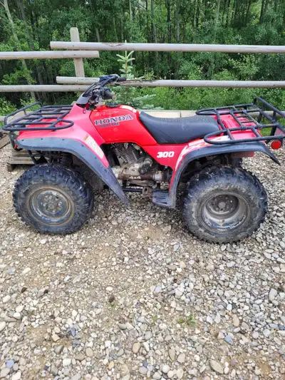 Quad for sale doesnt run, could be a project or parts quad $750.00 OBO Model is TRX300FW