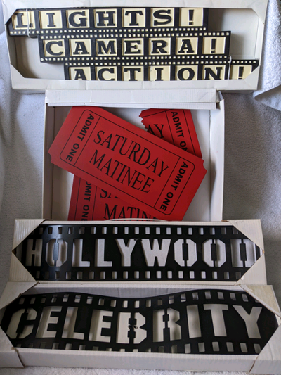 Four movie themed signs/decor items. Two large wood signs and two metal signs. Wood Admit One ticket...