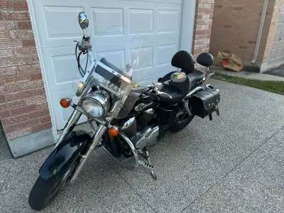 Deluxe model features extra chrome. If you're considering a Shadow ACE as your first/next bike, here...