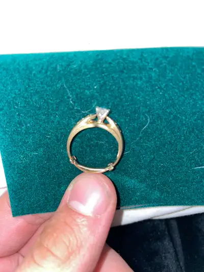 14k gold ring with .24 brilliant cut diamond, View more