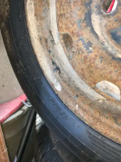For sale are four 175/70R13 tires, already mounted on steel rims, making them ready to install on yo...