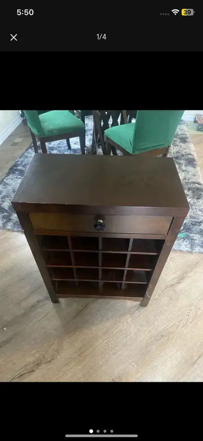 Wine storage cabinet/ dark oak stain. Open to offers or even trades! 16 slots for bottles. Dimension...