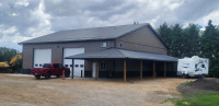 Farm acreage post and steel frame buildings.