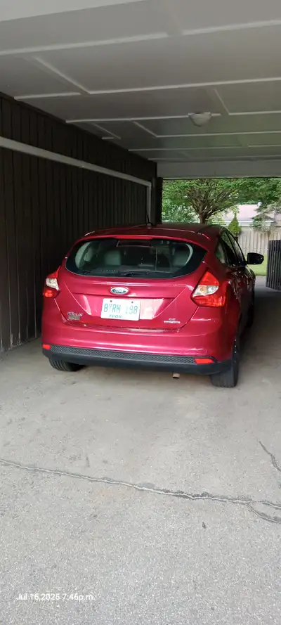 2014 Ruby Red Ford Focus, SE-Flex Fuel. Sun Roof, Air conditioning, heated front seats, leather inte...