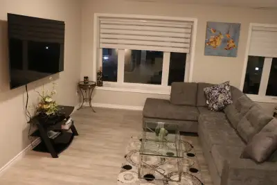 This spacious 4-bedroom, 2.5-bathroom home features an open-concept kitchen with new quartz countert...