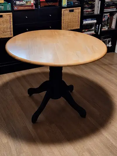 40" Round Pedestal Table with Folding Leaves, View more