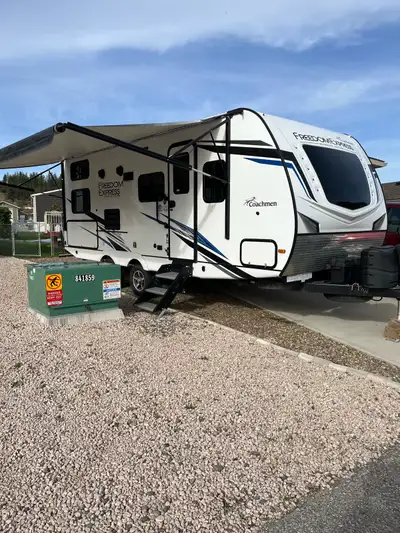Selling a 2022 Freedom Express Ultralite by Coachman, a lightweight travel easily pulled by 1/2 ton...