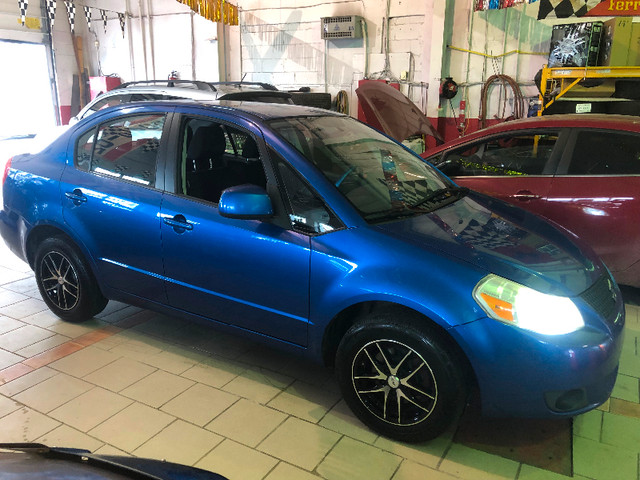 2012 SUZUKI SX4 LE/ BAS KM’s/ COMME NEUF/ TRÈS BONNE MÉCANIQUE dans Autos et camions  à Ville de Montréal - Image 3