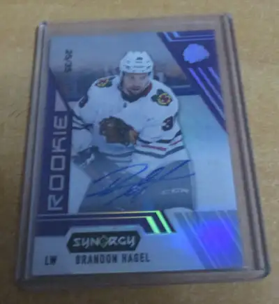 This Brandon Hagel Upperdeck Synergy Purple Rookie Autographed Card Is In Very Good Condition Number...