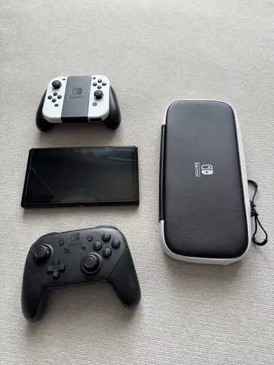 Everything is adult owned, barely used and like new. You get: 1) Nintendo Switch OLED 2) Dock + powe...