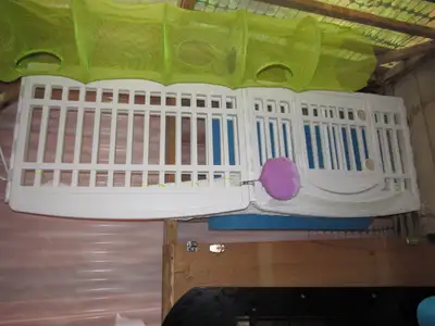 White plastic square 34-inch by 34-inch fordable dog cage., View more