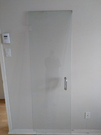 Shower Door made of glass, 22 X 74 inches could be used as table