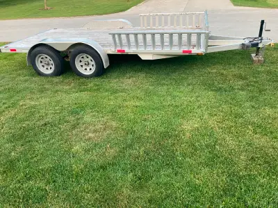 ATV/Utility Trailer 7x14. Read and side load. Ramps on side. Has breaks, pulls well.