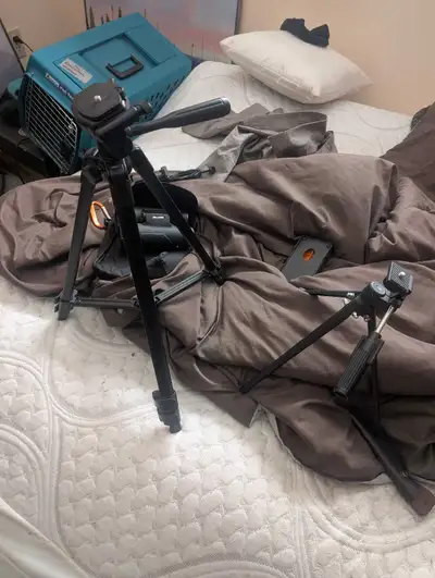 Got two tripods for sale. Both for $20 cash Binoculars are 12x42 I'll let em go for $40 Spotting sco...