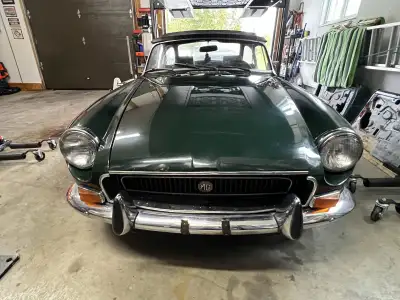 Beautiful one owner (before me) British Racing Green MG convertible with tan interior. I purchased t...