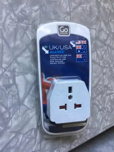 THE VISITOR TRAVEL ADAPTOR NEW IN PKG $10., View more