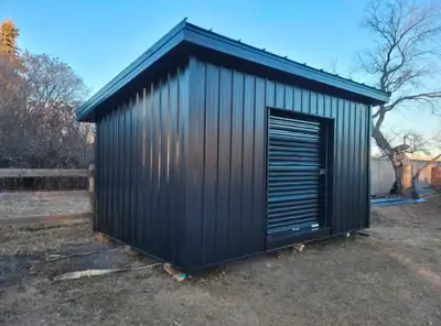 Another beautiful 10x16, Metal Siding, Standing seam Roof, Black 6' roll up door, Sitting on 3 4x6 s...
