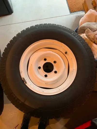 Rim size 5 x 139.7 (5 x 5.5") factory Dodge rims with P235/75R15 Pirelli tires, from first gen Dodge...