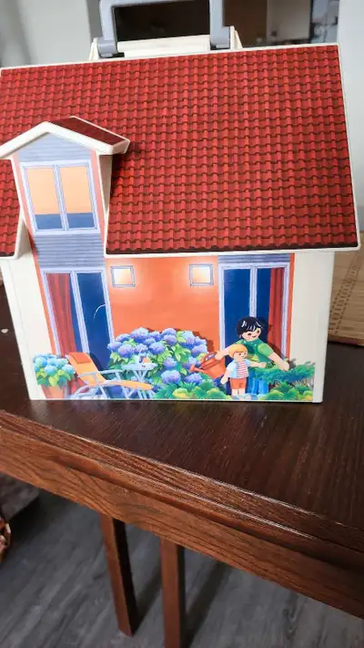 Step back in time with this vintage Playmobil house! This well-loved playset comes complete with fur...