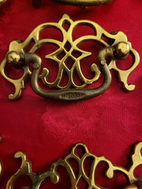 Vintage brass drawer pulls.