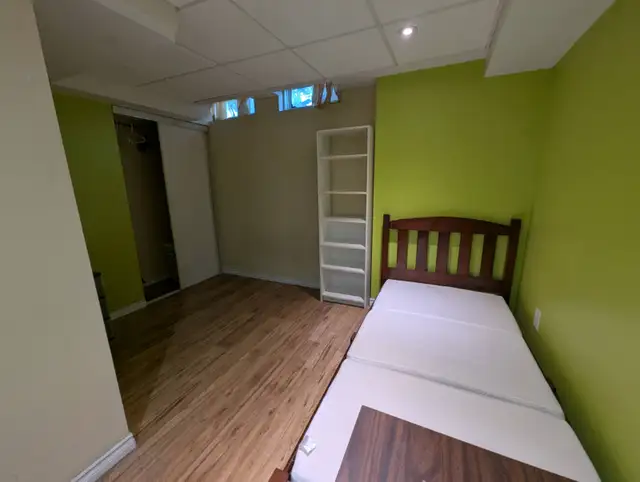 Furnished private basement suite with mini-kitchen and bathroom