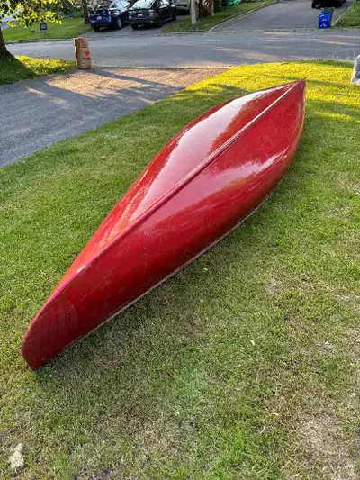 16-foot Fibreglass St Maurice canoe with: • Aluminum gunwales • Two new thwarts (one a yoke for carr...