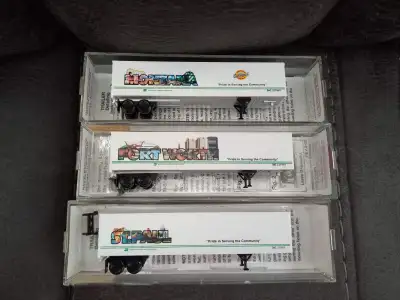 N scale Micro Trains trailers $30 each they come with both raised and lowered landing gear. Shipping...