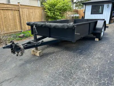 6x12 utility trailer 7,000 lbs single axel 6,000 lbs capacity New tires Trailer is 4 years old 2” re...