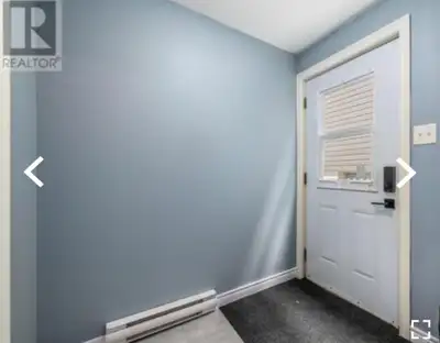 2 bedroom apartment located on a beautiful street with walking distance to beautiful trails and octa...