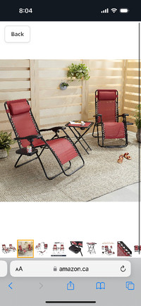 Brand new in box set of 2 zero gravity chairs with table