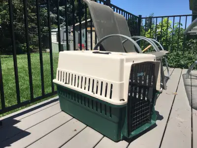 Good size cat or small dog carrier. $20, View more