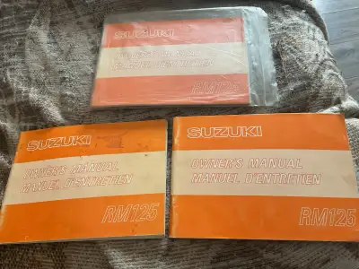 1979 Suzuki RM125 Owners Manuals New Used $130CAD new $65CAD used with slight stains $85CAD used Man...