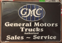 GMC Trucks and Chevrolet Metal signs