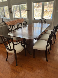 Antique dining table and 8 matching chairs