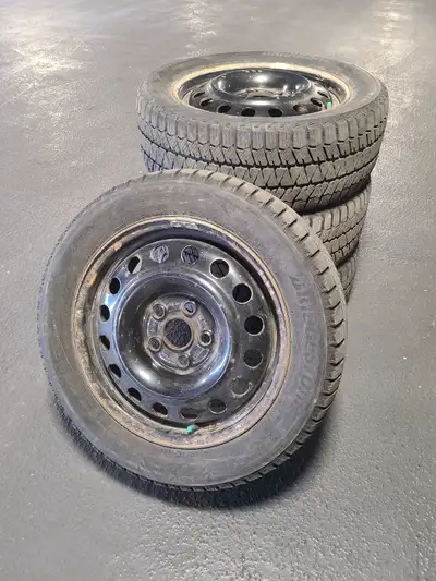 Bridgestone Blizzak Winter Tires for sale. Tire size is 205/55R16. Steel rims are 16 inch with 5x112...