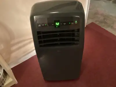 Portable LG 12,000 BTU air conditioner and window kit, View more