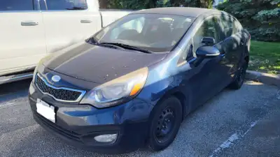 2014 KIA RIO Starts and drive Comfortable space at back seats. Huge capacity trunk dash cam, backup...
