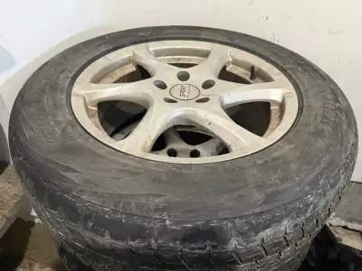 4 17” wheels and tires used as winters on a 2010 Mazda CX7 Bridgestone Blizzak tires 235-65-17 not m...
