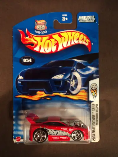 This red Mitsubishi Eclipse has pr5 wheels. The card has minor wear. Check out my other Hot Wheels M...