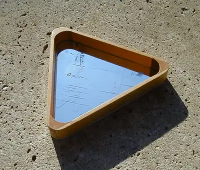 This vintage pool rack makes the frame of this mirror. The mirror is antique, distressed, aged. The...