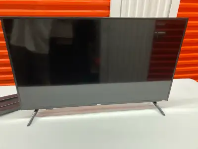 Used in perfect working order. Other then remote has crack. 40” Roku TV with build in stand or full...