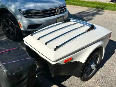 Adjustable air suspension. New 16” 5ply motorcycle tires. Very light weight. Safest bike trailer ava...