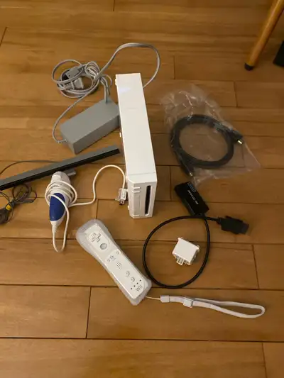 Excellent condition modded, nintendo wii with wiimote controller, nunchuk, motion plus adapter, moti...
