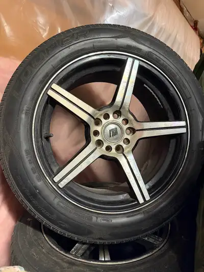 * Cooper Touring Tires mounted on 17” FOA rims. 225/55R17 tire size. Originally on a 2006 Mitsubishi...