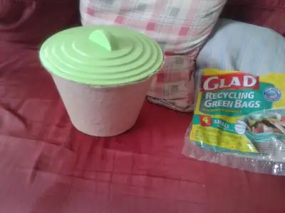 Greenlid kitchen organic pot with glad green bags. Forest, Ontario