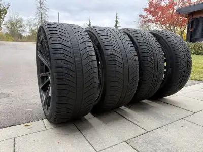Almost NEW - used ONE winter and full of tread. Rear 295/40 R20 and Front 265/45 R20. Mounted on ENV...