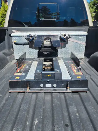 Like new Ford prep demco 21k lb autoslide fifth wheel hitch. Selling because I am not hauling a fith...