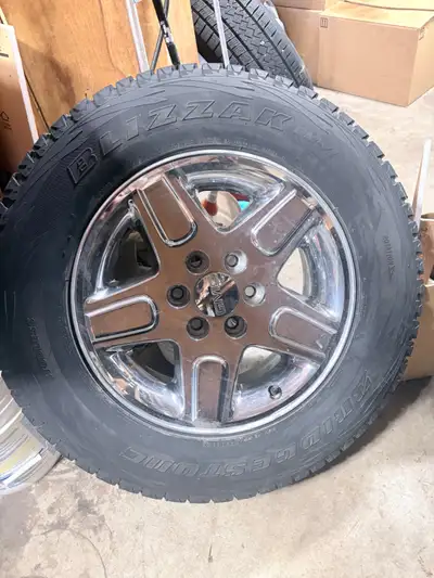 4 Blizzak snows in fair condition on factory wheels.